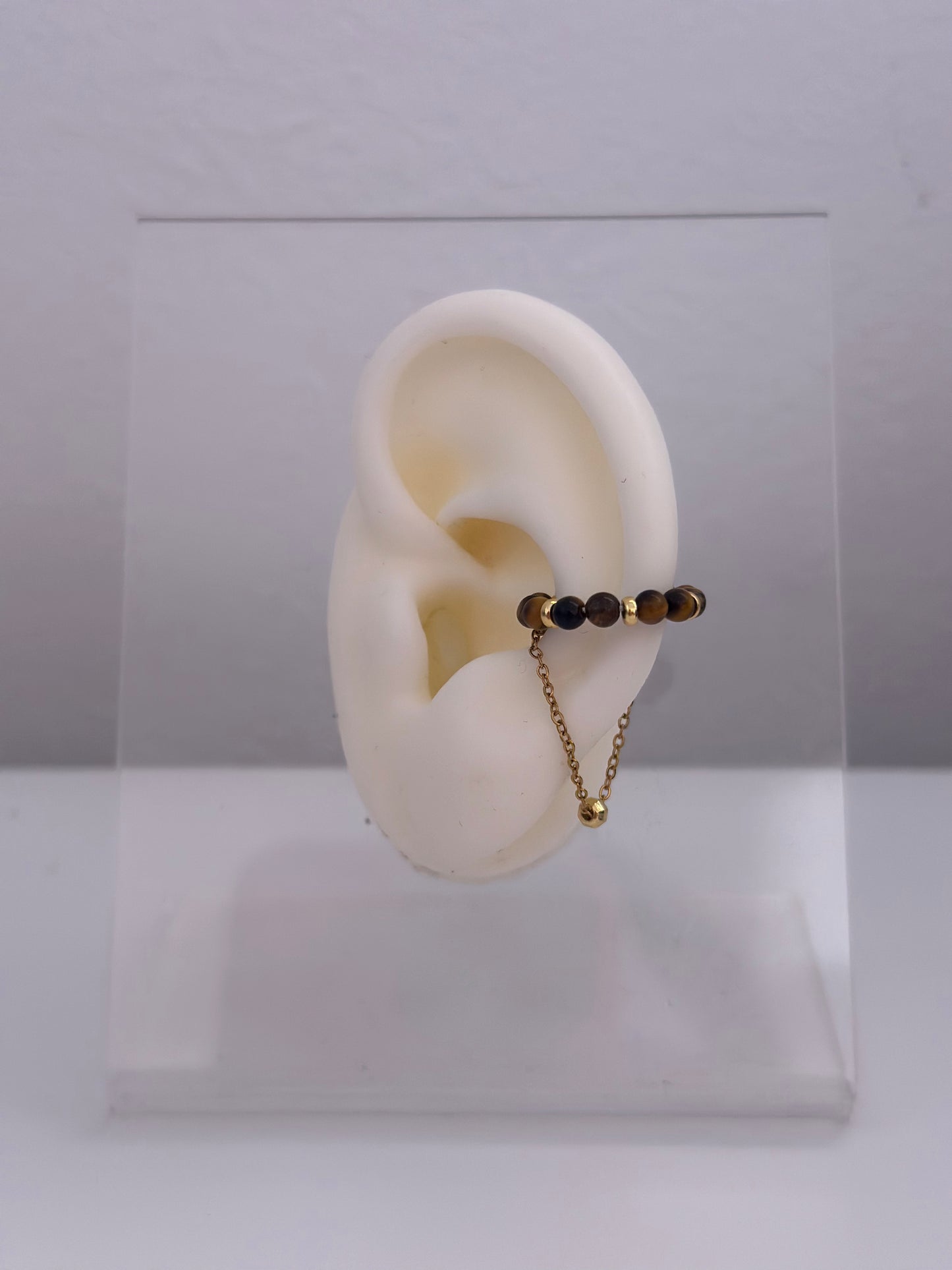 Earcuff Tera marrón y negro